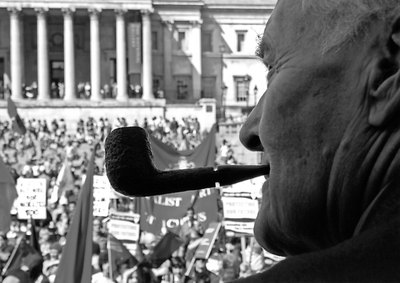 A Tony Benn's-eye view of Trafalgar Square full of crowds and banners.